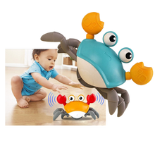 Carica l'immagine nel visualizzatore di Gallery, Granchio giocattolo con sensore di movimento - Ozerty
