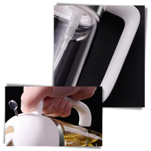 Carica l'immagine nel visualizzatore di Gallery, Bottiglia erogatrice di olio Spruzza &amp; Versa - Ozerty
