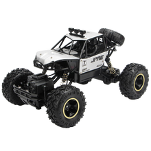 Carica l'immagine nel visualizzatore di Gallery, Auto fuoristrada 4WD telecomandata - Ozerty
